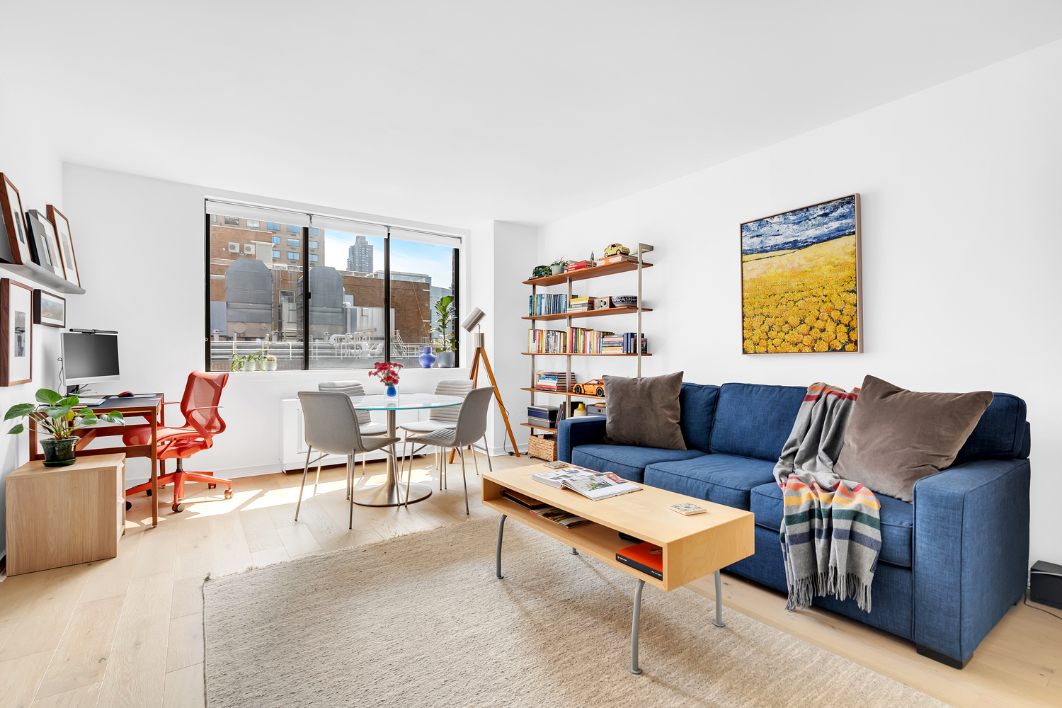 Luxury full-apartment gut renovation in Midtown West Manhattan with open-plan living, custom millwork, and herringbone oak floors